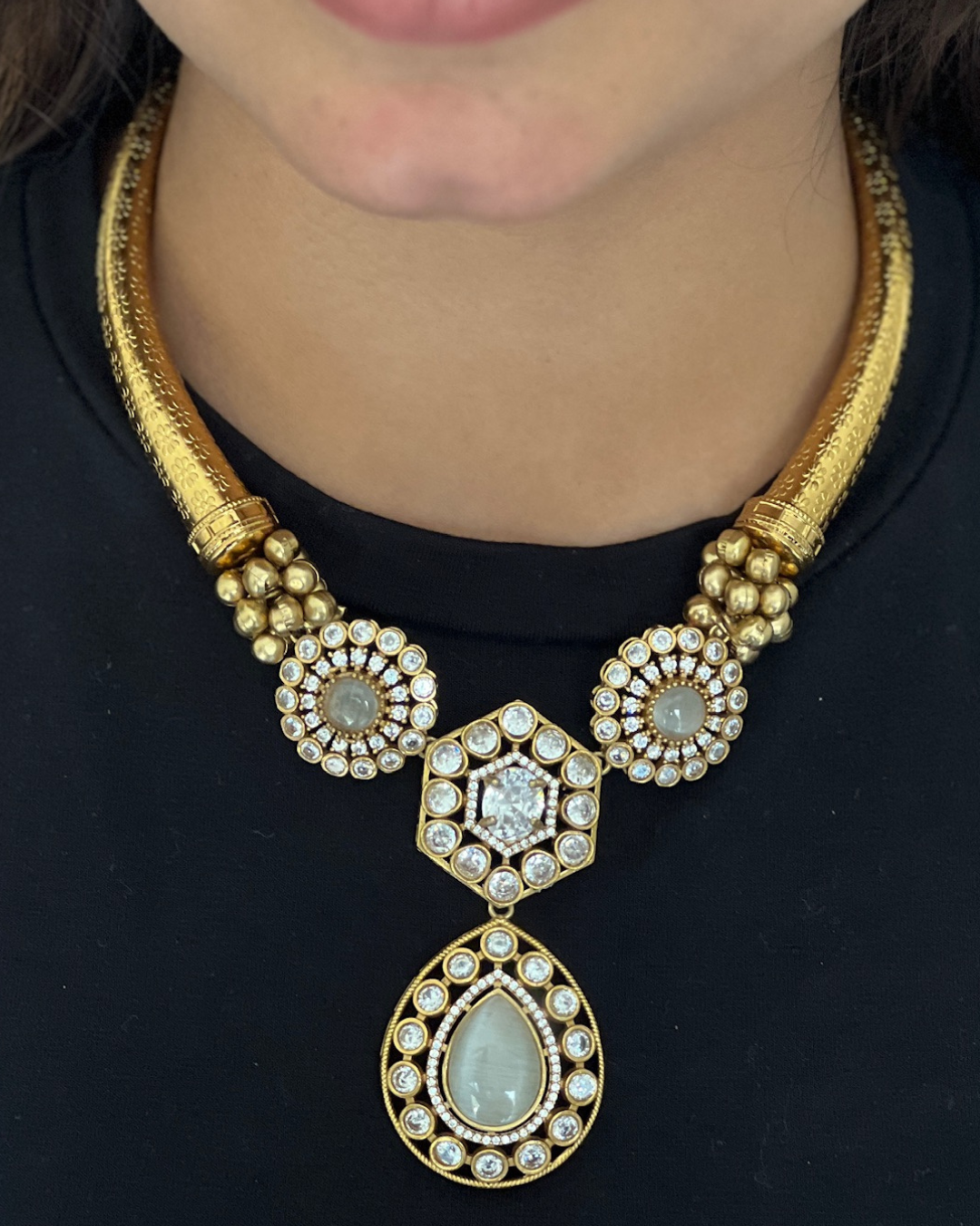Traditional Hasli Necklace Set with Crystal Studded Pendant