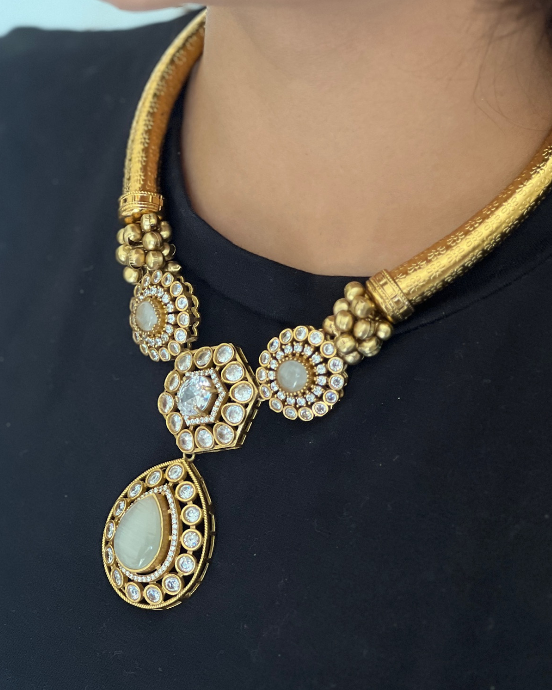 Traditional Hasli Necklace Set with Crystal Studded Pendant