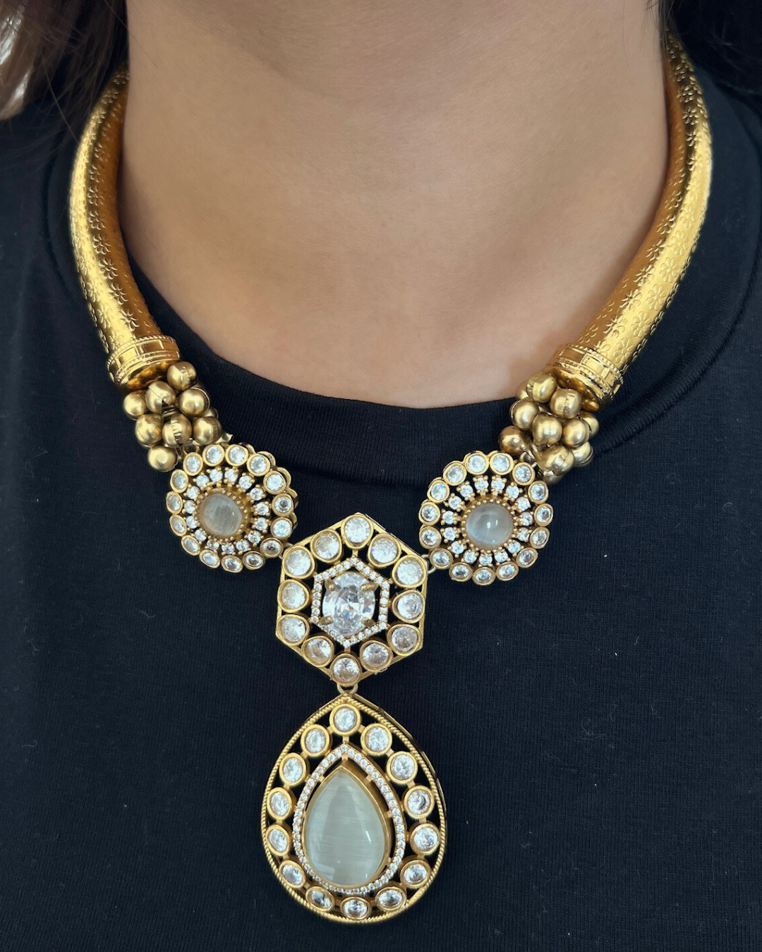 Traditional Hasli Necklace Set with Crystal Studded Pendant